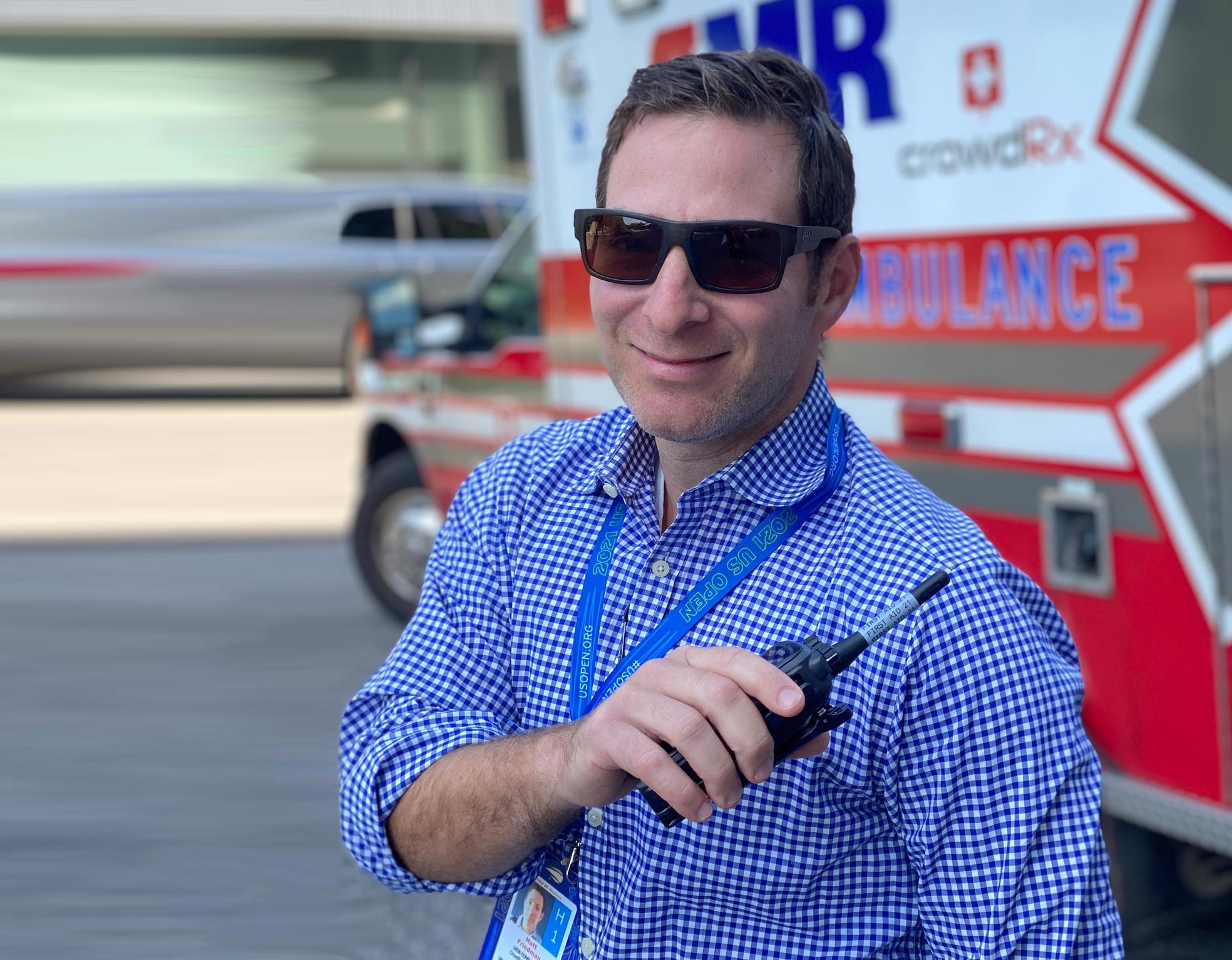 Doctor standing in front of ambulance